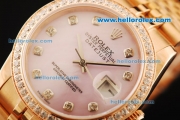 Rolex Oyster Perpetual Datejust Automatic Movement Rose Gold Case and Strap with Pink Dial and Diamond Markers/Bezel
