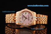 Rolex Oyster Perpetual Datejust Automatic Movement Rose Gold Case and Strap with Pink Dial and Diamond Markers/Bezel